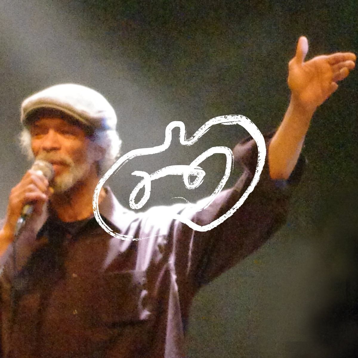 Gil Scott-Heron singing on stage, with the white apple mark drawn over the photo